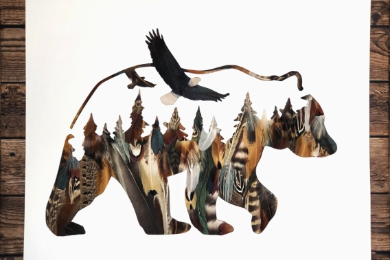 An image of a bear silhouette art piece. The silhouette shown using feather from pheasants, grouse and chukar.