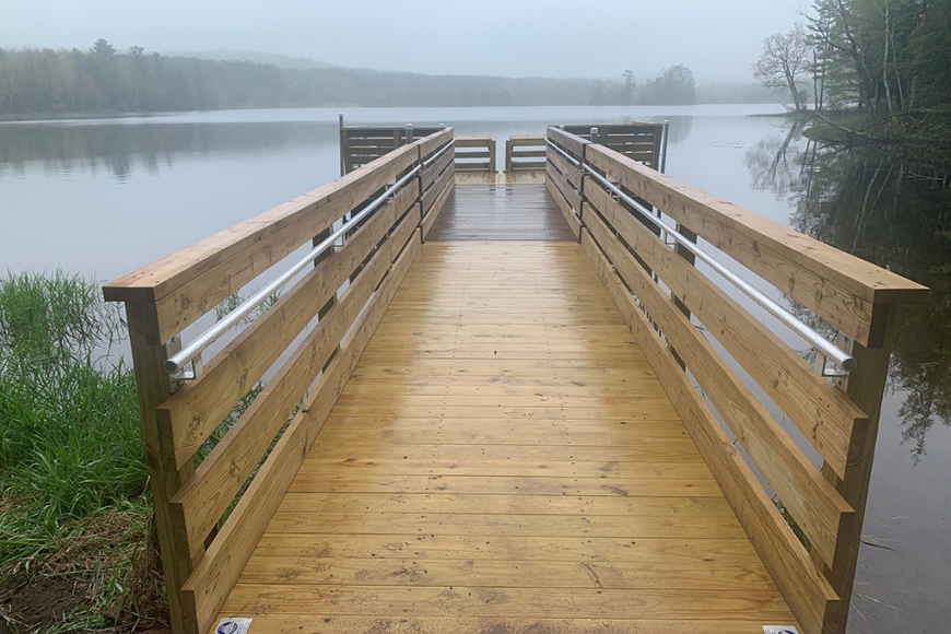  An accessible fishing pier at Loon Lake on a foggy morning at Copper Falls State Park
