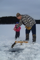 Dad and daughter on the ice