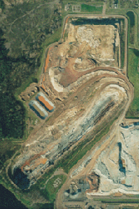 An aerial view of the Flambeau Mine during active mining operations. The Flambeau River is located in the southwest corner of the photograph.
