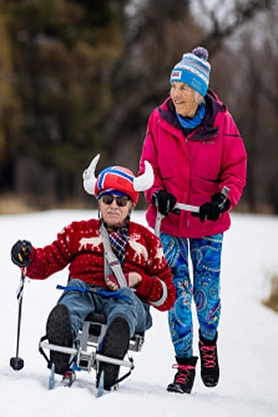 A skier uses the adaptive cross-country sit ski on the Man-Made Snow Trail at Kettle Moraine State Forest – Lapham Peak. 