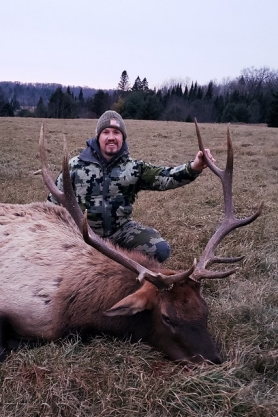hunter with elk