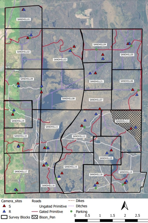 A map of Sandhill Wildlife Area shows where Snapshot trail camera pairs are located