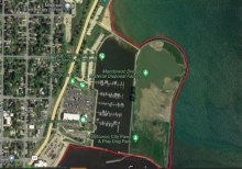 A map showing a example of man-made upland shorelines by Manitowoc Dredge Material Disposal Facility within Manitowoc County using a red link to indicate the boundary.