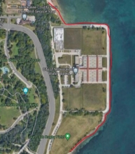 A map showing a example of man-made upland shorelines by City of Milwaukee Water Works within Milwaukee County using a red link to indicate the boundary.