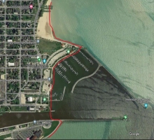 A map showing a example of man-made upland shorelines by City of Racine Harbor within Racine County using a red link to indicate the boundary.