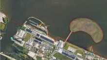 A map showing a example of man-made upland shorelines on Renard Island and the connecting access causeway within Brown County using a red link to indicate the boundary.