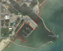 A map showing a example of man-made upland shorelines in Algoma Harbor within Kewaunee County using a red link to indicate the boundary.