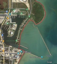 A map showing a example of man-made upland shorelines in Kewaunee Harbor within Kewaunee County using a red link to indicate the boundary.