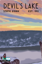 Winter sunset over bluffs and lake labeled Devil’s Lake State Park Est. 1911.