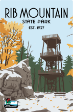 Winter view of rock structure and overlook tower labeled Rib Mountain State Park Est. 1927