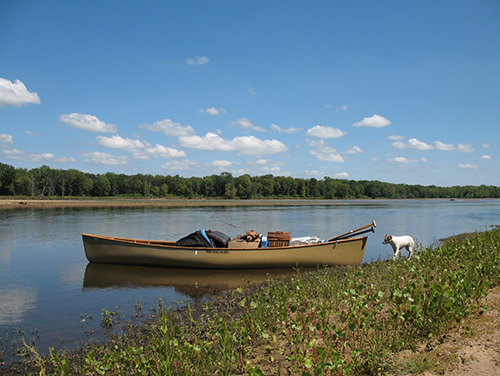 A canoe and dog along the Wisconsin River
