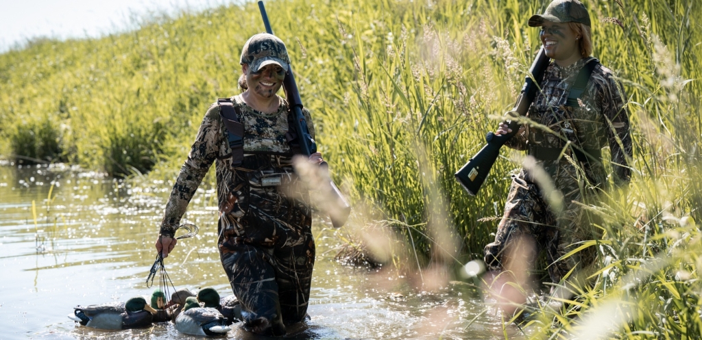Women duck hunting.