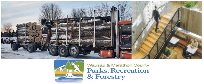 A logging truck in winter, full of newly cut timber.