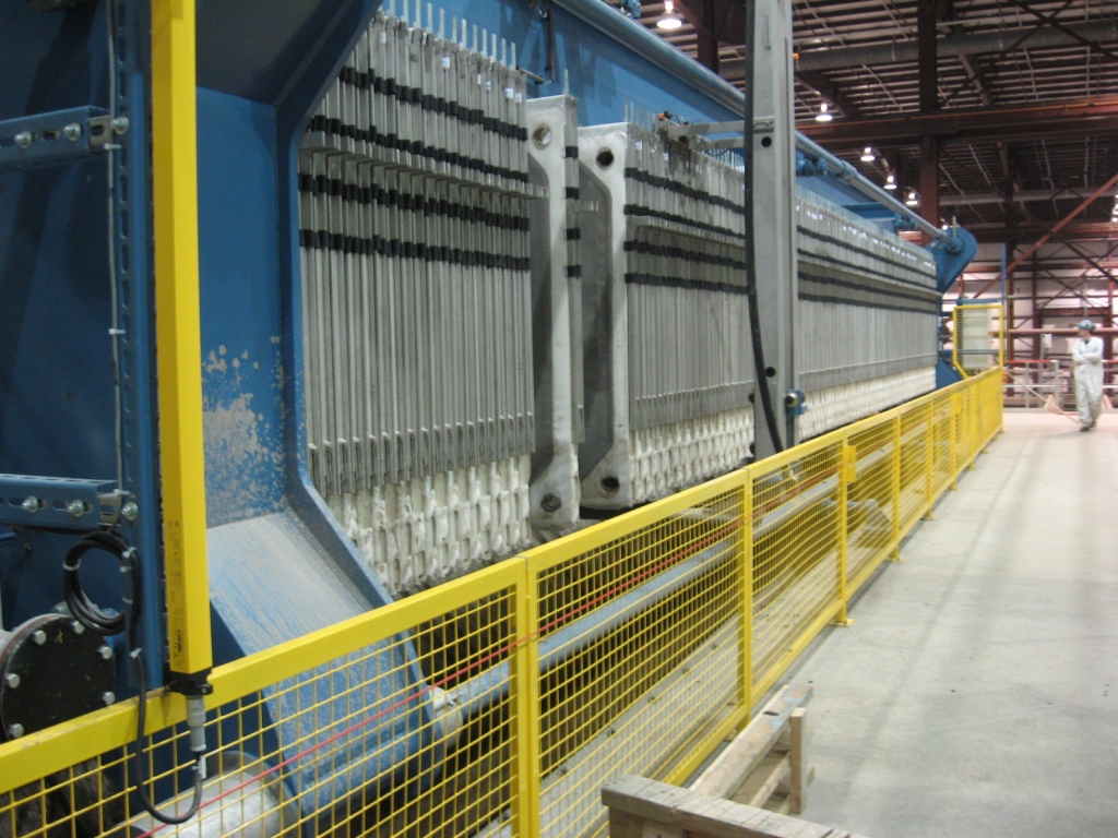 One of eight rows of plate presses that operated continuously. Photo: The Boldt Co.