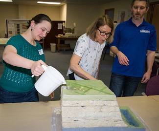 Educational model of karst topography demonstrating how water may flow in the fractured bedrock.