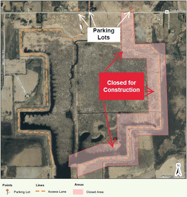 This map shows a section of Jefferson Marsh that will be closed for construction starting in January 2025. The closed area is highlighted in red, with directional arrows pointing to it. Nearby parking lots are indicated in white text, and access lanes are marked with dashed orange lines.