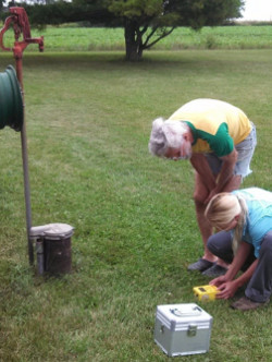 Staff from WGNHS using a passive seismic instrument © WGNHS
