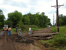 Department and PSC staff inspect construction of a transmission line through a wetland.