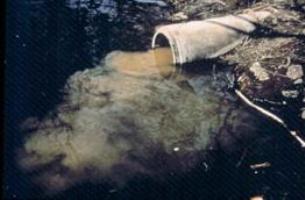 DNR Photo: Storm sewer outfall discharging sediment to a stream